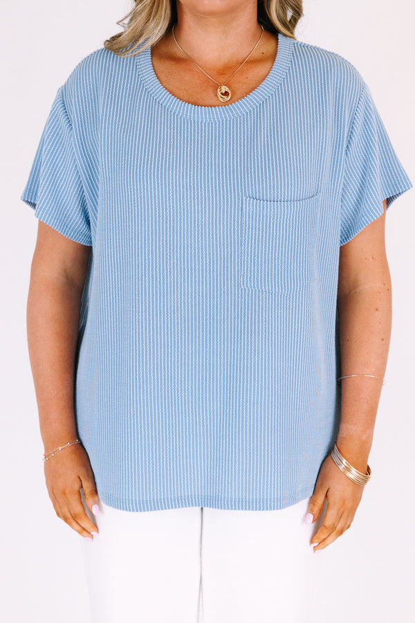 Short sleeve dusty blue top with ribbed details and front pocket