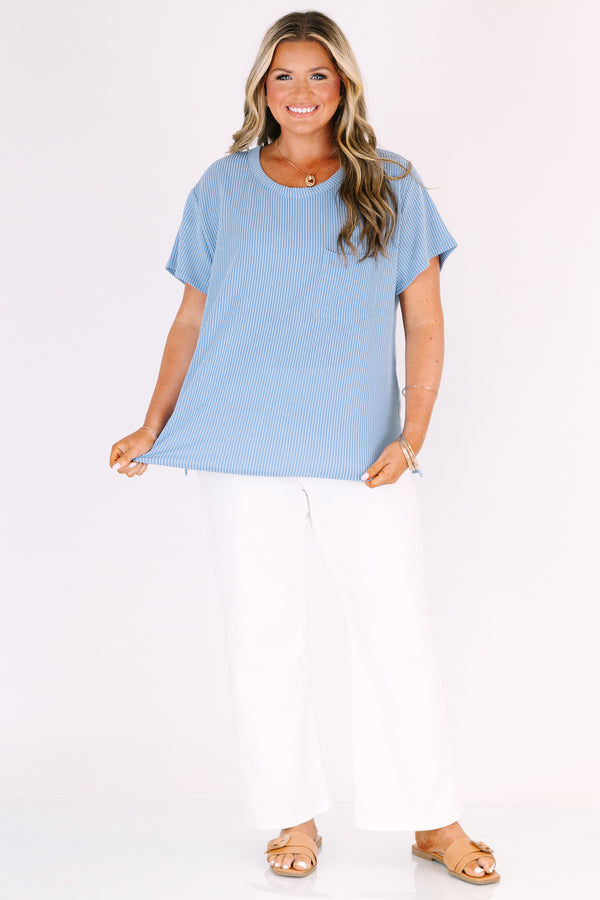Short sleeve dusty blue top with ribbed details and front pocket