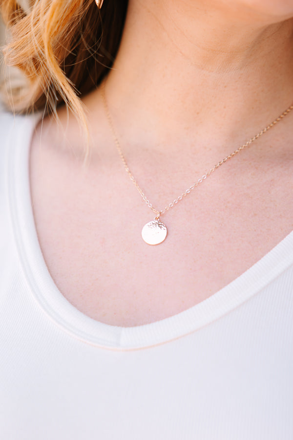 Chic Soul plus size clothing, gold necklace with a a distressed metal circle charm hanging off the center of the necklace 