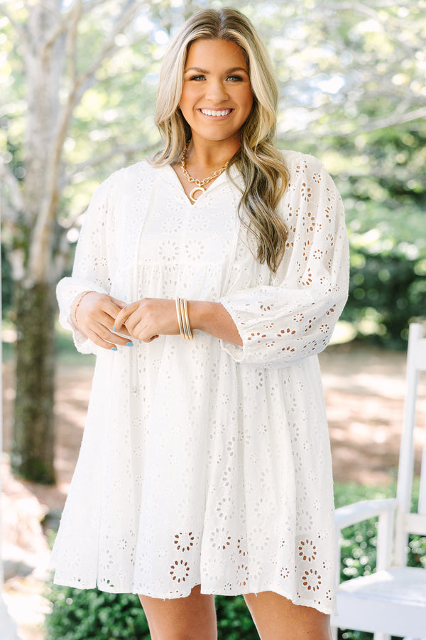 Chic Soul plus size clothing, white eyelet long sleeve babydoll dress with v neckline and tassels hanging from the collar
