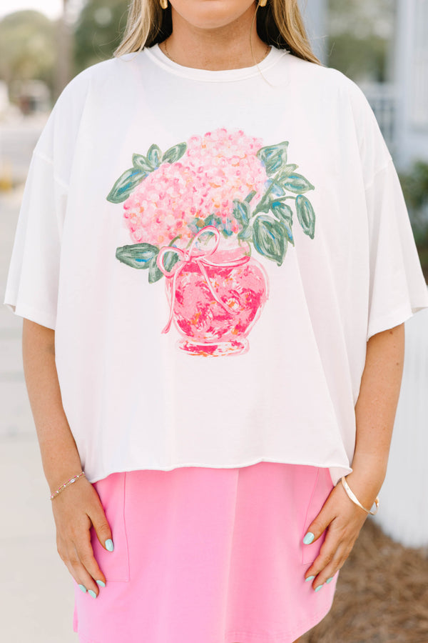 Chic Soul plus size clothing, white short sleeve vintage wash cropped tee with pink hydrangea flower and green leaves inside pink vase with pink bow tied around the top of the vase