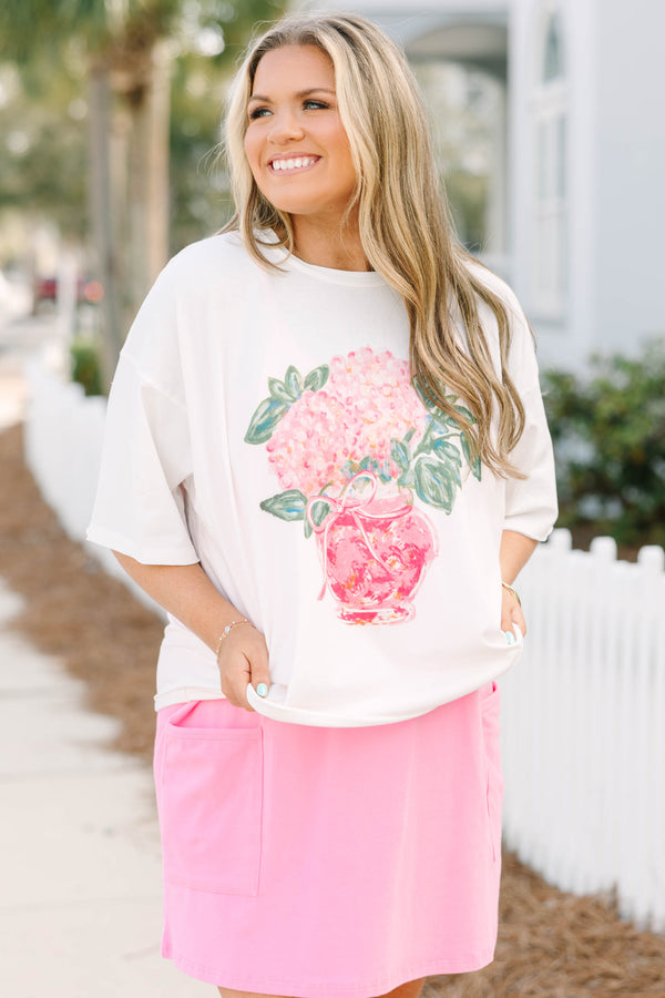 Chic Soul plus size clothing, white short sleeve vintage wash cropped tee with pink hydrangea flower and green leaves inside pink vase with pink bow tied around the top of the vase