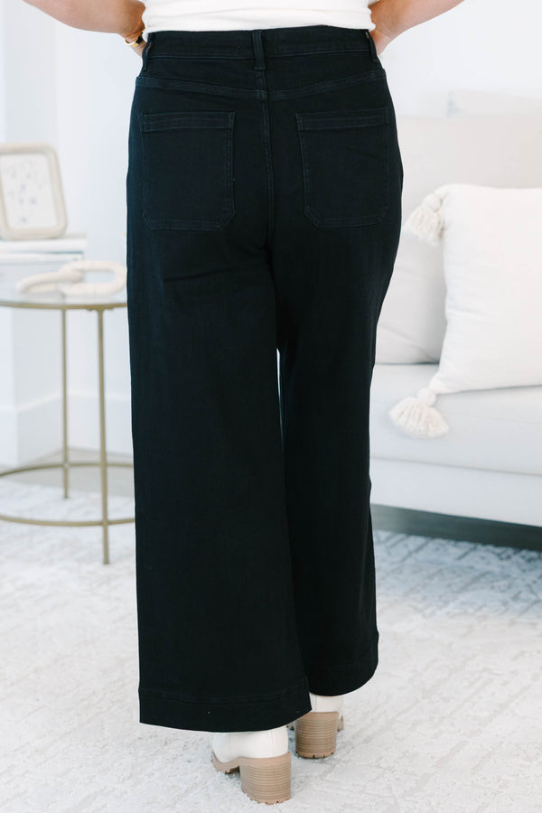 Plus size black wide leg jeans with front seam detail and a comfortable high-waisted fit.