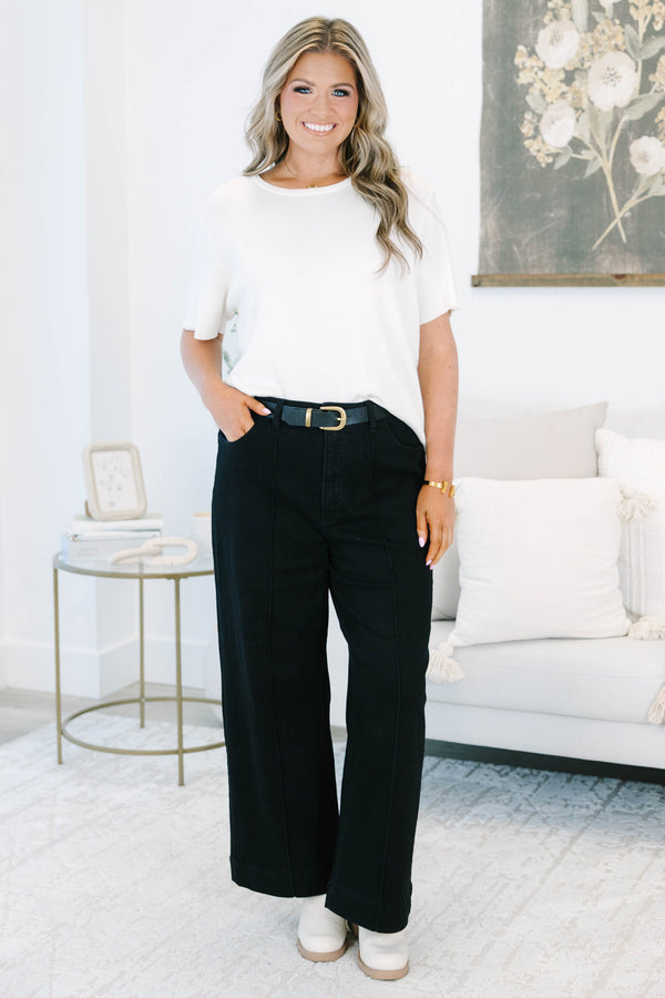 Plus size black wide leg jeans with front seam detail and a comfortable high-waisted fit.