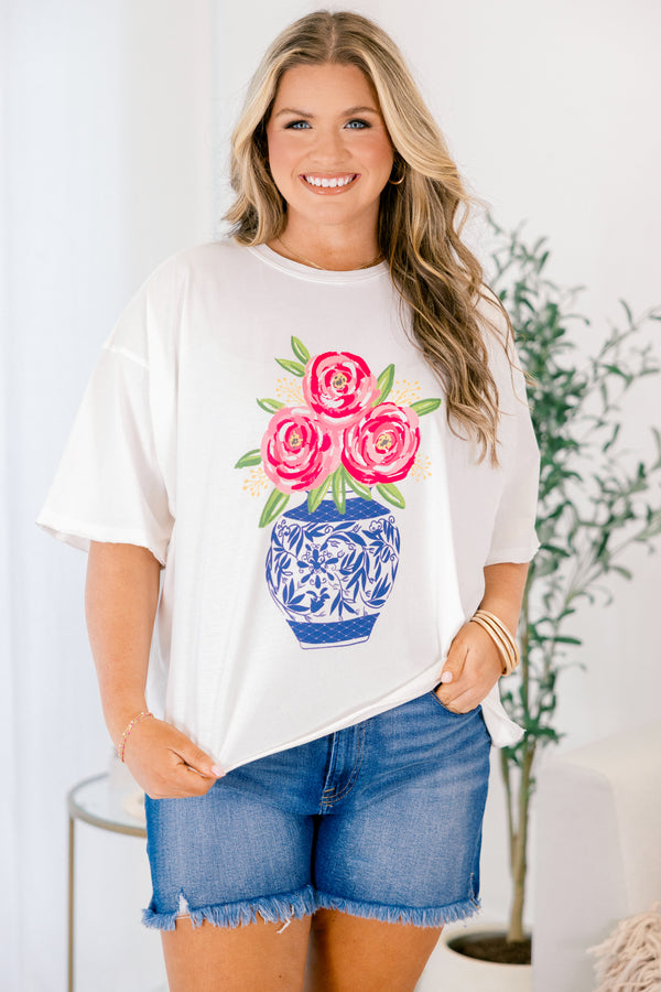 Chic Soul plus size clothing, white short sleeve graphic tee with a blue Chinoiserie vase graphic that has pink flowers coming out of the vase that is surrounded by green leaves 