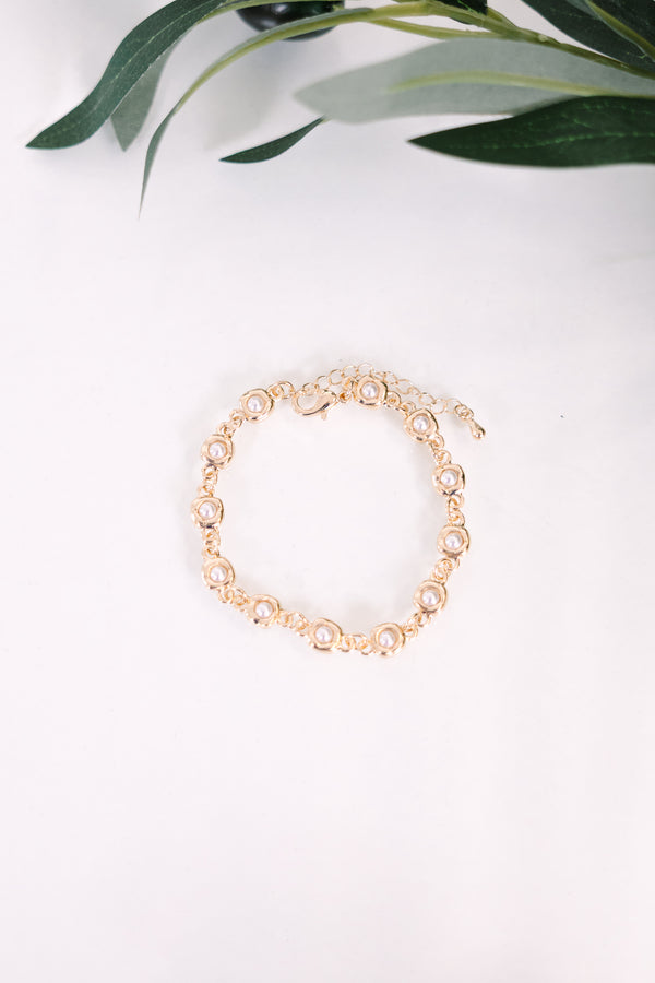 Plus Size gold chain bracelet featuring small circular links with inset white pearl accents.