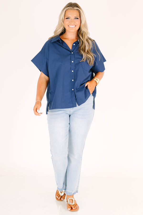 Plus Size light wash flare jeans with a high-rise fit and frayed raw hems.