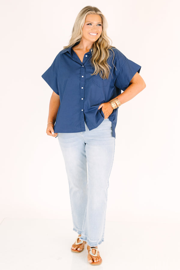 Plus Size light wash flare jeans with a high-rise fit and frayed raw hems.