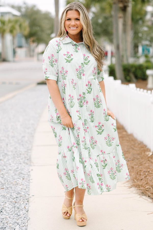 Chic Soul plus size clothing, mint striped maxi dress with short sleeves featuring a cuff a collar and buttons extending to the bottom of the chest  with an all-over floral block pattern. 
