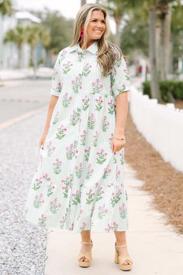 Chic Soul plus size clothing, mint striped maxi dress with short sleeves featuring a cuff a collar and buttons extending to the bottom of the chest  with an all-over floral block pattern. 
