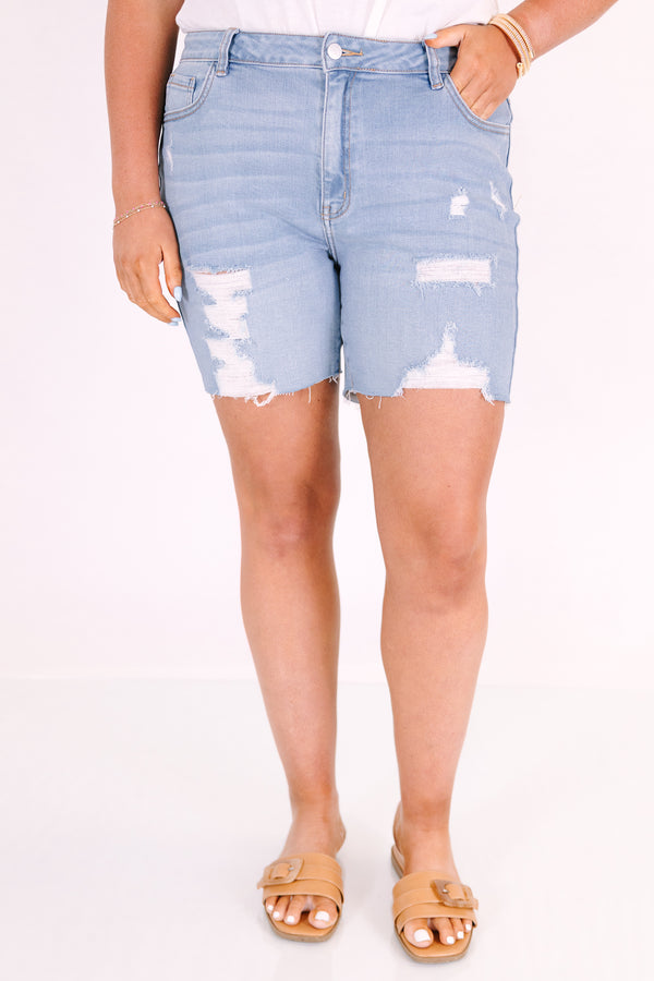 Chic Soul plus size clothing, light wash denim shorts with distressing and a raw hem