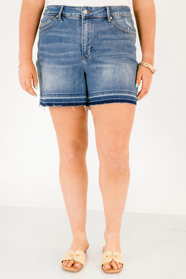 Chic Soul plus size clothing, dark washed jean shorts with front pockets and a distressed look as well as fringe details on the bottom of each short leg