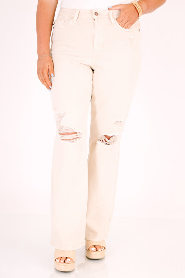 Plus Size high-rise straight leg jeans in bone with distressed knees and a relaxed fit.