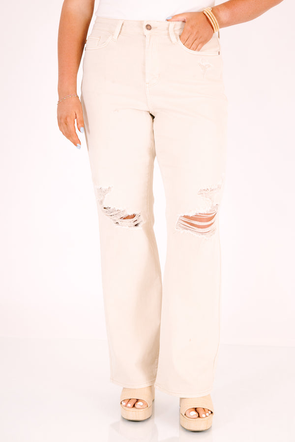 Plus Size high-rise straight leg jeans in bone with distressed knees and a relaxed fit.