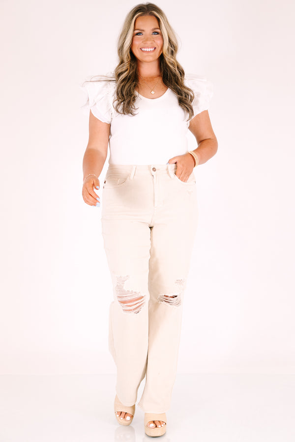 Plus Size high-rise straight leg jeans in bone with distressed knees and a relaxed fit.