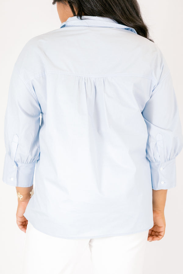 Chic Soul plus size clothing, light blue button up top with a collar and long sleeves that have cuffs at the ends 