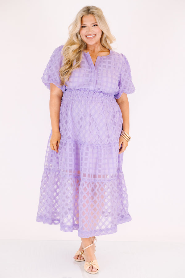Chic Soul plus size clothing, lilac knee length dress with bubble sleeves as well as a sheer maxi dress overlay that has a checkered pattern 