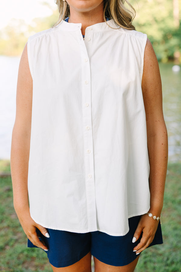 Plus Size white sleeveless button-down tank with a mandarin collar and navy blue shorts.