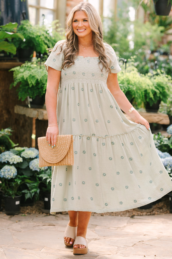 Chic Soul plus size clothing,  green maxi dress with a square neckline a smocked chest short sleeves and darker green floral embroidered pattern throughout