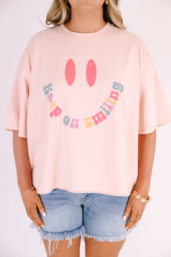 Chic Soul plus size clothing, blush pink short sleeve slightly cropped tee with a large smiley face in the middle with the mouthing being the text 