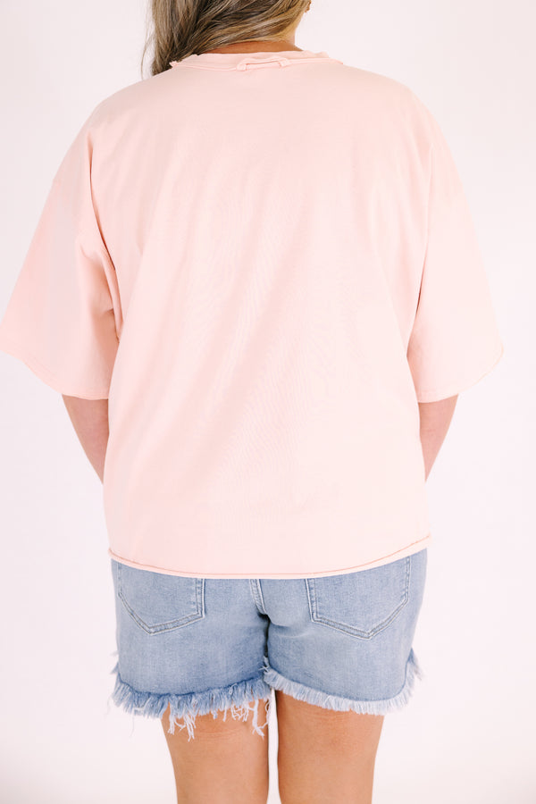 Chic Soul plus size clothing, blush pink short sleeve slightly cropped tee with a large smiley face in the middle with the mouthing being the text 