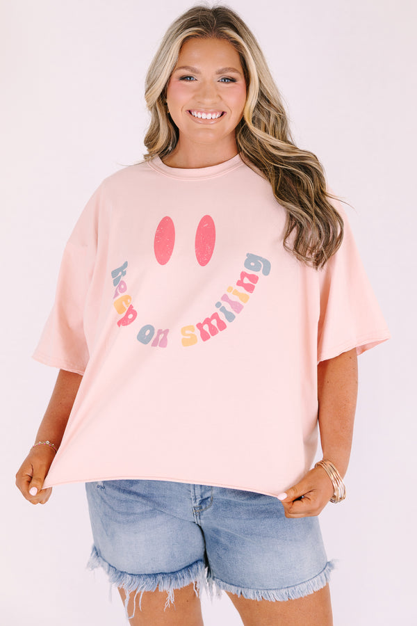 Chic Soul plus size clothing, blush pink short sleeve slightly cropped tee with a large smiley face in the middle with the mouthing being the text 