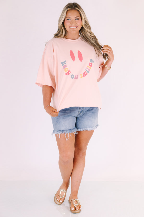 Chic Soul plus size clothing, blush pink short sleeve slightly cropped tee with a large smiley face in the middle with the mouthing being the text 