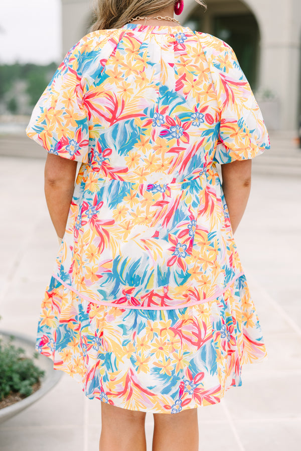 Plus Size yellow floral print cotton dress with a split v-neck, puff sleeves, and ruffled hem.