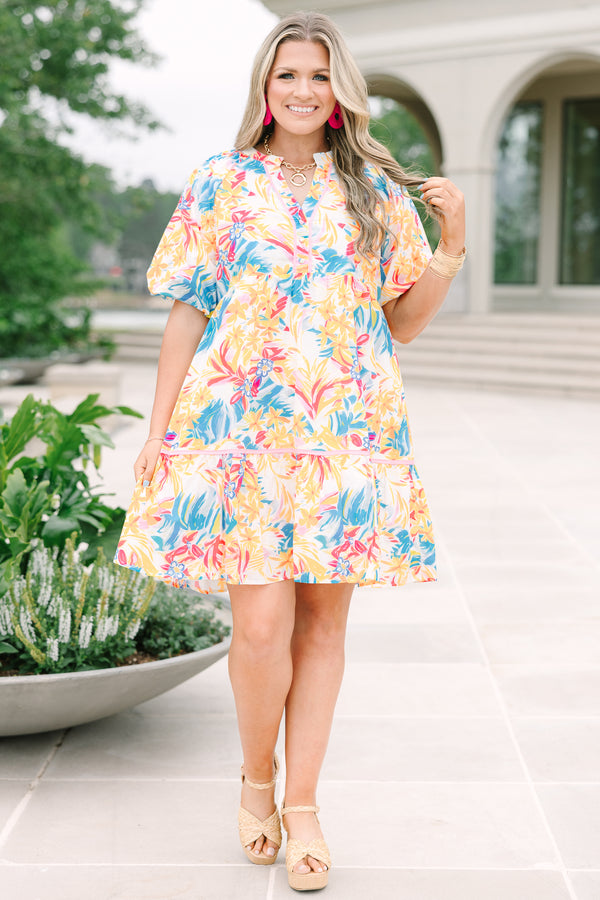 Plus Size yellow floral print cotton dress with a split v-neck, puff sleeves, and ruffled hem.