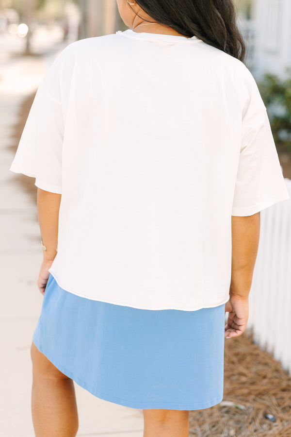 Chic Soul plus size clothing, white short sleeve slightly cropped tee with watercolor abstract American flag and light blue bow on it