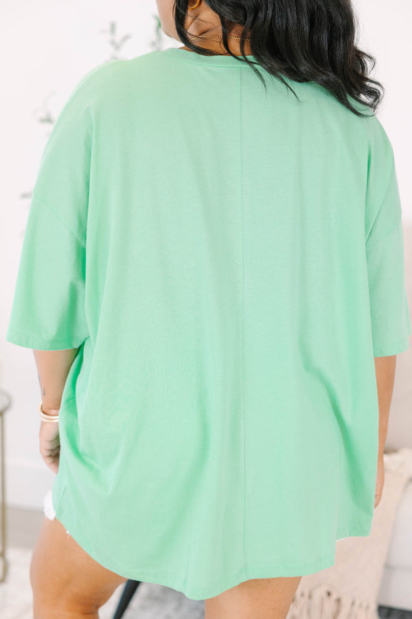 Plus Size mint green boyfriend tee with a Later Gator graphic and white denim shorts.