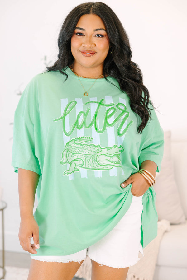 Plus Size mint green boyfriend tee with a Later Gator graphic and white denim shorts.