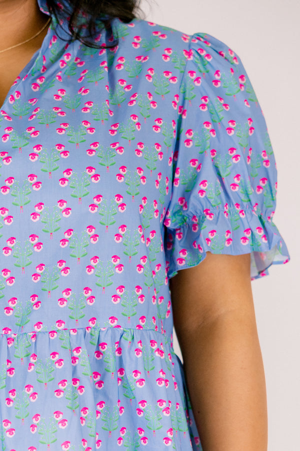 Chic Soul plus size clothing, light blue short puff sleeve peplum top with small hot pink and green floral block print and a v neckline cutout