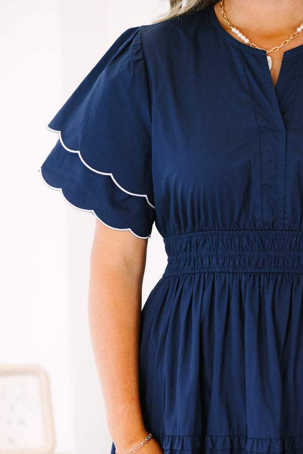 Plus Size navy tiered midi dress with scalloped flutter sleeves and a split neckline.