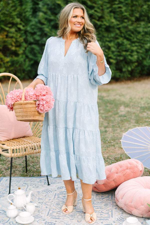 Chic Soul plus size clothing, baby blue tiered midi dress with half sleeves that that have a ruffle detail at the end of each sleeve as well a slight v-neckline and subtle floral pattern 