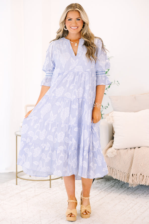 Plus Size blue and white striped tiered midi dress with floral print and puff sleeves.
