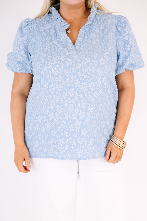 Chic Soul plus size clothing, blue top with bubble sleeves and a slight v-neckline as well as a floral textured pattern throughout 