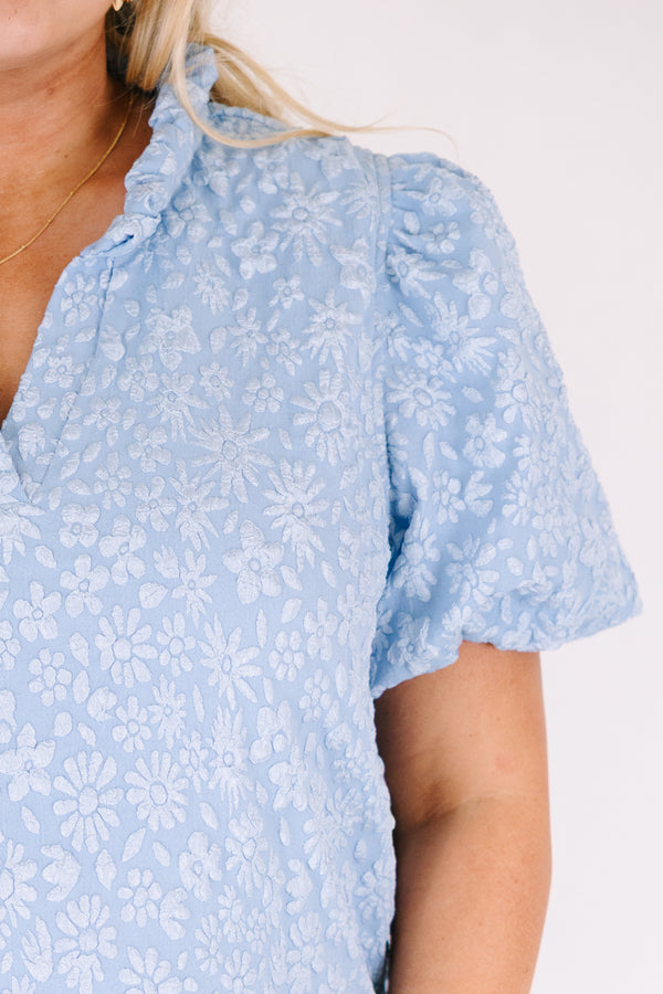 Chic Soul plus size clothing, blue top with bubble sleeves and a slight v-neckline as well as a floral textured pattern throughout 