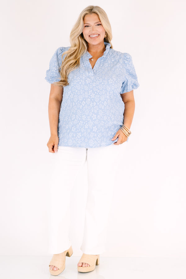 Chic Soul plus size clothing, blue top with bubble sleeves and a slight v-neckline as well as a floral textured pattern throughout 