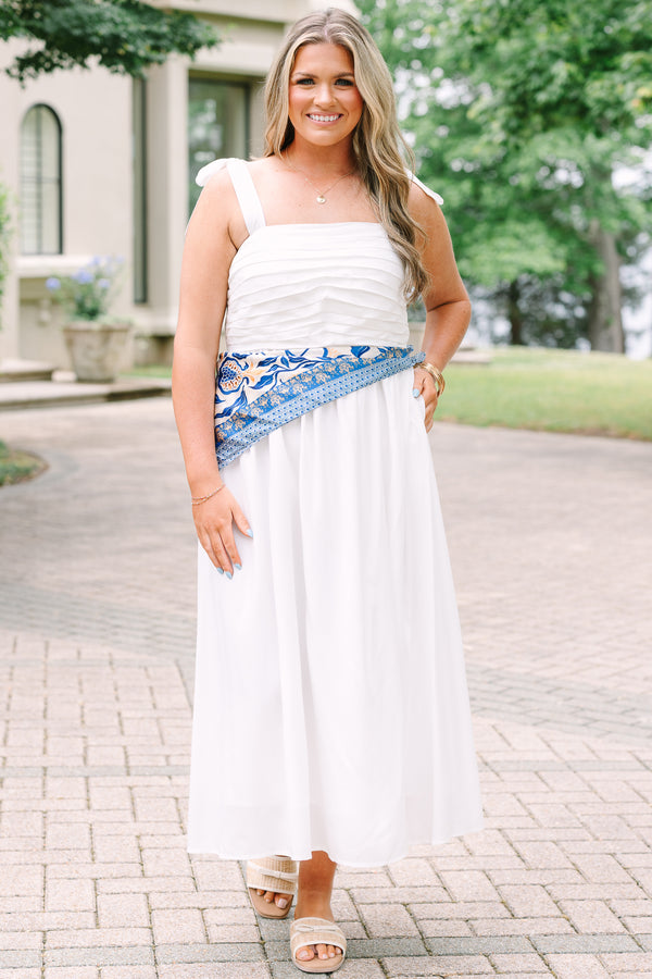 Plus Size white midi dress with a pleated bodice, tie-shoulder straps, and a blue patterned sash.