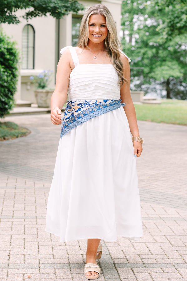 Plus Size white midi dress with a pleated bodice, tie-shoulder straps, and a blue patterned sash.