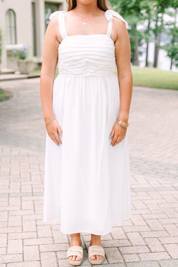 Plus Size white midi dress with a pleated bodice, tie-shoulder straps, and a blue patterned sash.