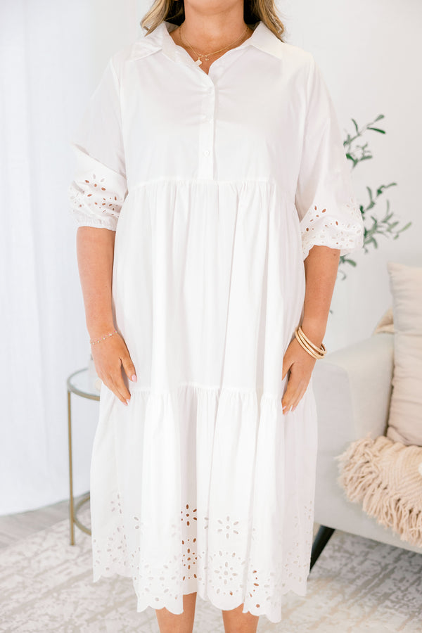 Chic Soul plus size clothing, White midid dress with buttons going down to the bottom of the chest and a collar of the neckline as well as eyelet details at the end of the sleeves and bottom of the dress 
