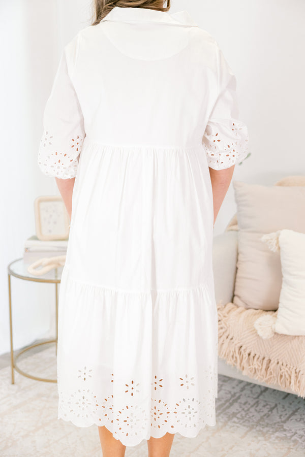 Chic Soul plus size clothing, White midid dress with buttons going down to the bottom of the chest and a collar of the neckline as well as eyelet details at the end of the sleeves and bottom of the dress 
