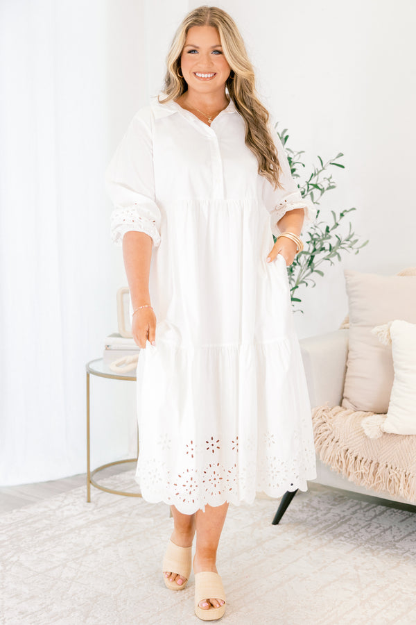 Chic Soul plus size clothing, White midid dress with buttons going down to the bottom of the chest and a collar of the neckline as well as eyelet details at the end of the sleeves and bottom of the dress 
