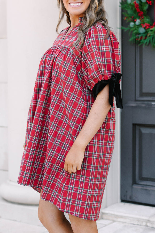 Plus Size red plaid babydoll dress with puff sleeves and black velvet bow details.