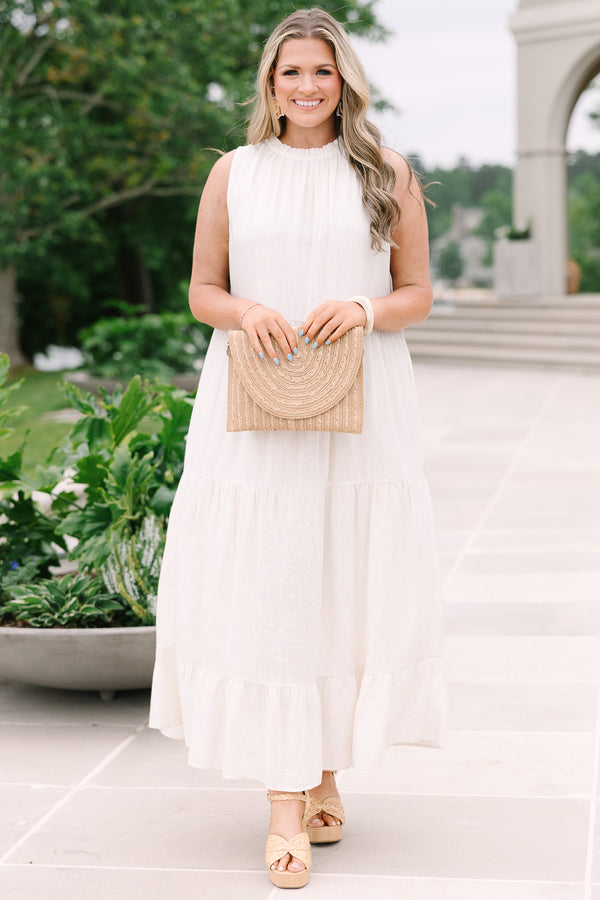 Chic Soul Plus Size Clothing, an oatmeal maxi-dress with four tiers and a ruffle detail at the collar and bow at back neck