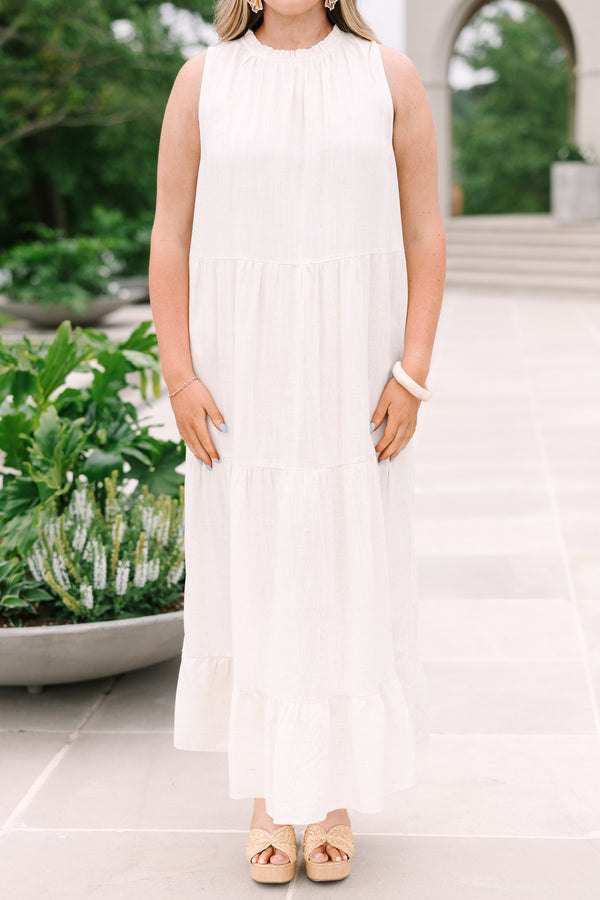 Chic Soul Plus Size Clothing, an oatmeal maxi-dress with four tiers and a ruffle detail at the collar and bow at back neck