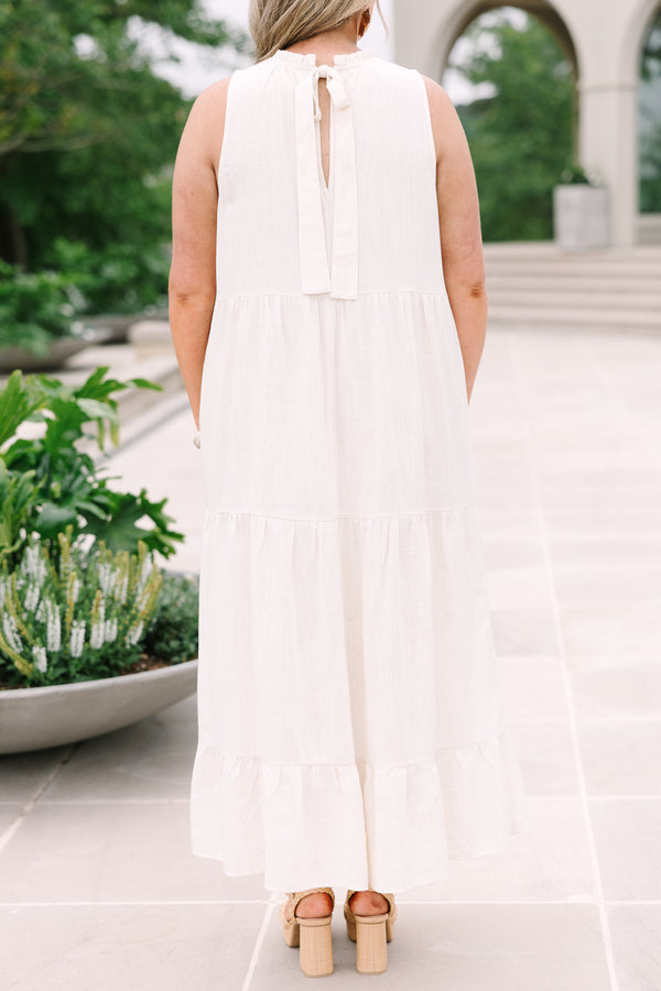 Chic Soul Plus Size Clothing, an oatmeal maxi-dress with four tiers and a ruffle detail at the collar and bow at back neck