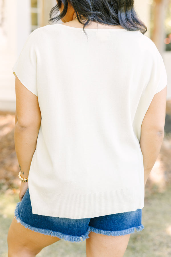 Plus Size short sleeve yellow V-neck sweater with a relaxed fit and side slits.
